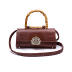 BOLSA TOP HANDLE EAST WEST PEQUENA COURO LIZARD PINHÃO