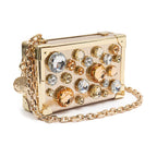 CLUTCH  TRUNK EM COURO METALIZADO COM CRISTAIS OURO
