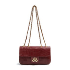 BOLSA ANNE EM COURO CAIMAM CARMIM OURO