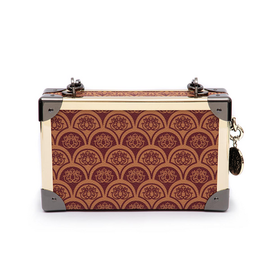 CLUTCH  TRUNK SIRENA MONOGRAMA CANVAS CAREMELO