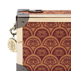 CLUTCH  TRUNK SIRENA MONOGRAMA CANVAS CAREMELO